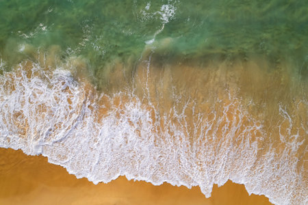 Beautiful sea beach and waves texture in sunny summer day background,Phuket Thailand,Top view beach