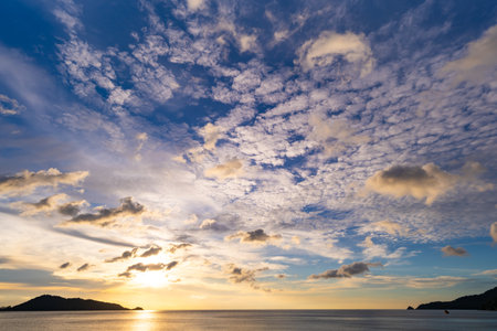 Sunset sky background,Landscape nature beautiful Light Sunset or sunrise over sea, Colorful clouds scenery sky,Amazing clouds and waves in sunset sky nature light cloud backgroundの写真素材