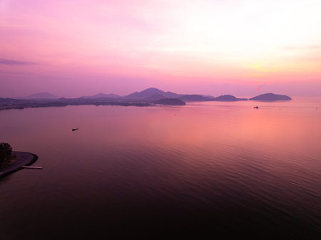 Aerial view sunset sky,Nature beautiful Light Sunset or sunrise over sea,Colorful scenery Sky with Amazing clouds and waves in sunset sky purple light cloud backgroundの写真素材