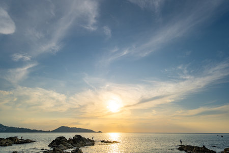 Beautiful clouds in sunset or sunrise over sea,Colorful scenery sunset sky, Amazing clouds wonderful light sky backgroundの写真素材