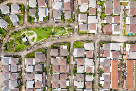 New development real estate. Aerial view of residential houses and driveways neighborhood during a fall sunset or sunrise time. Tightly packed homes. Top view over private houses in phuket thailandの写真素材