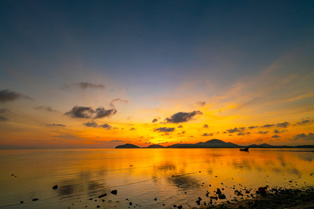 Landscape of colorful clouds in sunset or sunrise sky over sea with reflection in the tropical sea,Beautiful seascape scenery,Amazing light of nature Landscape nature backgroundの写真素材