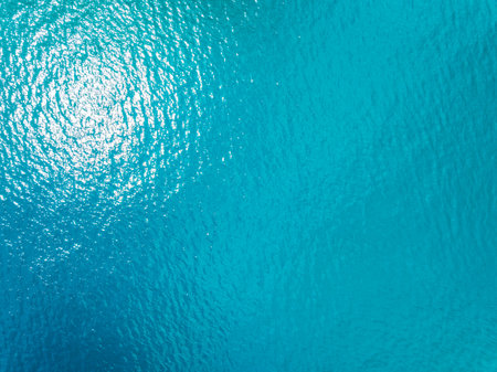 Sea surface aerial view,Bird eye view photo of waves water surface texture,Summer sea background,Beautiful nature Amazing view sea backgroundの写真素材