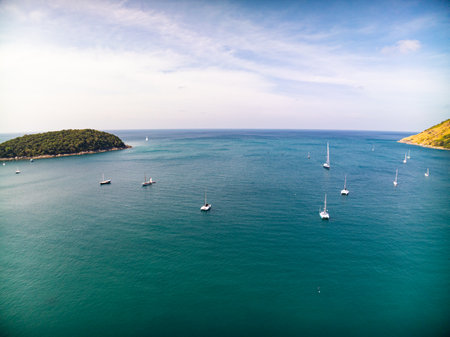 Beautiful seashore nature landscape,Amazing landscape waves crashing on rock in summer season background,Wide angle view drone shotの写真素材