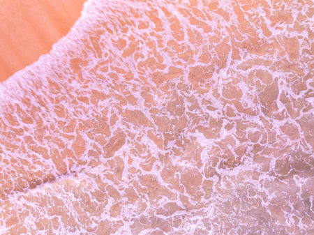 Beautiful colorful sand beach nature background,Amazing beach waves background, Aerial view wide angle sea backgroundの写真素材