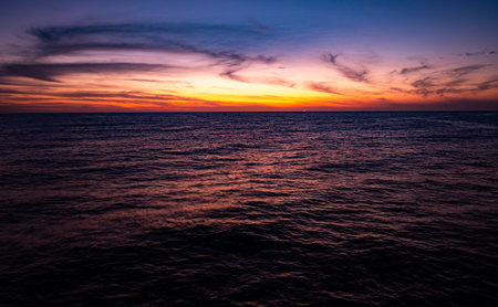 Aerial view beautiful sea surface nature background, Amazing waves texture ocean with cloudsの写真素材