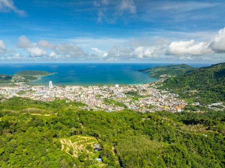 High angle view Patong bay with mountains rainforest treesの写真素材