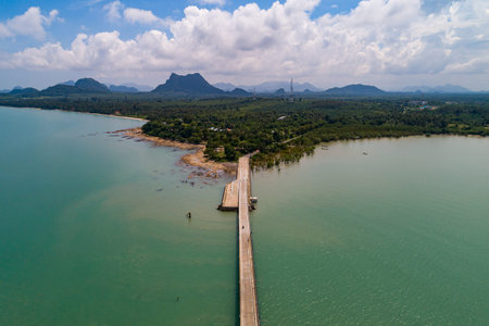 Aerial drone bird's eye view photo of small bridge in to the sea in beautiful island,Amazing sea...