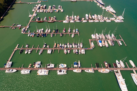 Aerial View Drone shot of Yacht and sailboat parking in marina, Transportation and travel backgroundの写真素材