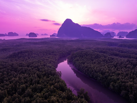 Aerial view landscape mountains colorful purple sky over seaの写真素材
