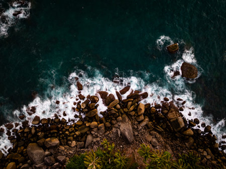 Top view sea surface nature background,Big waves crashing on rocks seascape background