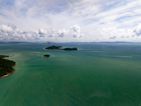 Aerial view landscape sea beach in raining season at Phuket island Thailandの写真素材