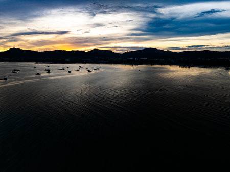 Aerial view sunset sky Beautiful light sunset or sunrise over sea Colorful scenery sunset sky waves texture backgroundの写真素材