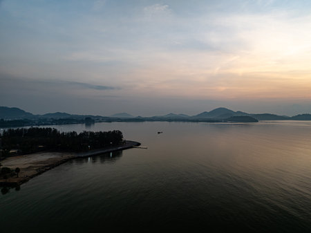 Beautiful sky sunset or sunrise clouds over sea nature backgroundの写真素材