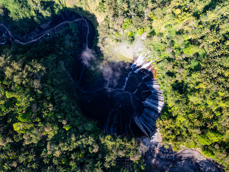 Aerial view of the Tumpak Sewu Waterfalls also known as Coban Sewu.Beautiful Tumpak Sewu Waterfalls are a tourist attraction in East Java, Indonesia.Amazing travel destination in asiaの写真素材