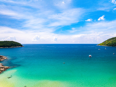 Aerial view of a blue sea surface water texture background and sun reflections Aerial flying drone view Waves water surface texture on sunny tropical oceanの写真素材