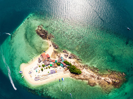 Drone aerial view shot of Tropical sea with beautiful small island in Phuket Thailand