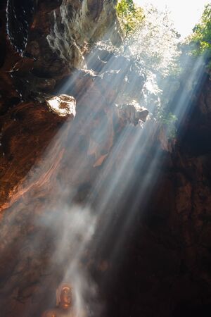 Sun rays in caveの写真素材