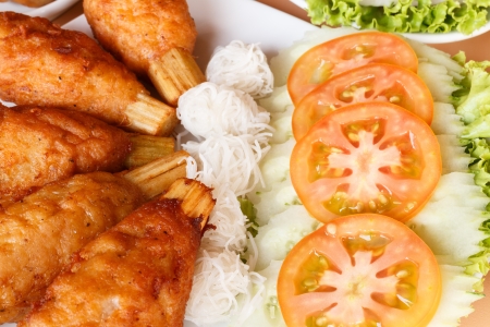 Sugar cane skewered fried minced shrimpsの写真素材