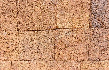 Laterite stone brick wallの写真素材