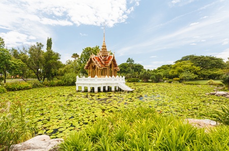 Thai temple on the waterの写真素材