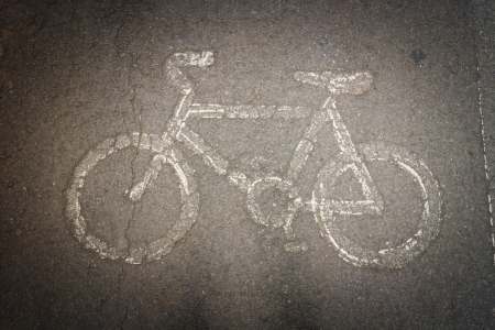 white painted sign for bikes laneの写真素材