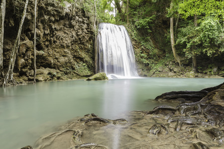 Waterfall in tropical forest at Erawan national park Kanchanaburi province, Thailandの写真素材