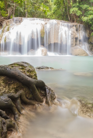 Waterfall in tropical forest at Erawan national park Kanchanaburi province, Thailandの写真素材