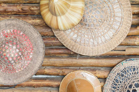 Traditional hat on wooden wallの写真素材