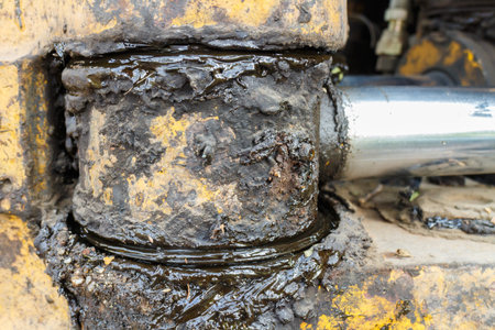 close up view of greasy gears from old machine