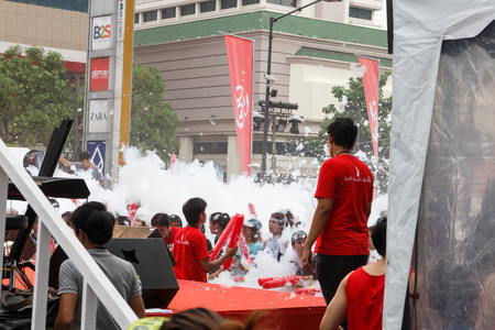 BANGKOK, THAILAND - APRIL 12  Locals and tourists enjoy in  Bangkok Songkran Festival 2014 Thailand new year   at Central World on April 12,2014 in Bangkok, Thailandのeditorial素材