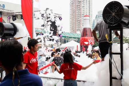 BANGKOK, THAILAND - APRIL 12  Locals and tourists enjoy in  Bangkok Songkran Festival 2014 Thailand new year   at Central World on April 12,2014 in Bangkok, Thailandのeditorial素材