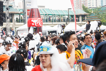 BANGKOK, THAILAND - APRIL 12  Locals and tourists enjoy in  Bangkok Songkran Festival 2014 Thailand new year   at Central World on April 12,2014 in Bangkok, Thailandのeditorial素材
