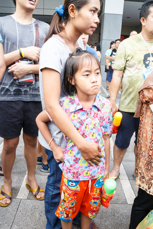 BANGKOK, THAILAND - APRIL 12  Locals and tourists enjoy in  Bangkok Songkran Festival 2014 Thailand new year   at Central World on April 12,2014 in Bangkok, Thailandのeditorial素材