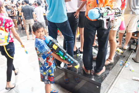 BANGKOK, THAILAND - APRIL 12  Locals and tourists enjoy in  Bangkok Songkran Festival 2014 Thailand new year   at Central World on April 12,2014 in Bangkok, Thailandのeditorial素材