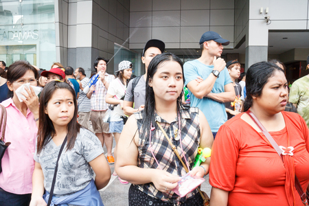BANGKOK, THAILAND - APRIL 12  Locals and tourists enjoy in  Bangkok Songkran Festival 2014 Thailand new year   at Central World on April 12,2014 in Bangkok, Thailandのeditorial素材