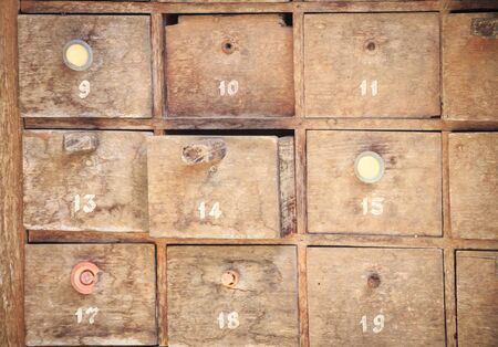 Stack of old wooden drawersの写真素材
