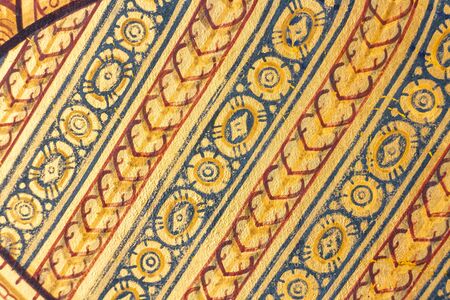 Traditional Thai art on temple wallの写真素材