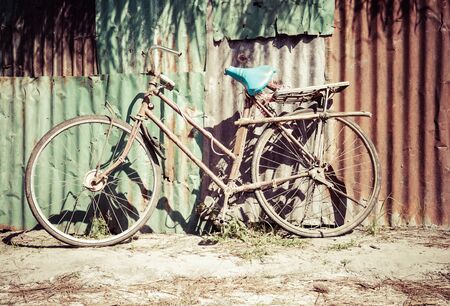 Old rusty vintage bicycleの写真素材