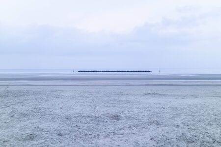 natural stone breakwater in the seaの写真素材