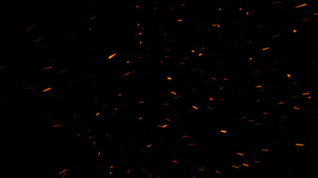 burning ash background. Sparks backdrop. Flickering abstract particlesの写真素材