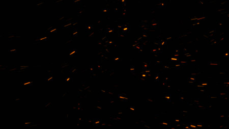 burning ash background. Sparks backdrop. Flickering abstract particlesの写真素材