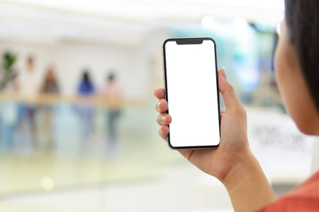 blank black phone payment through smartphone shopping mall background making show shopping for input...
