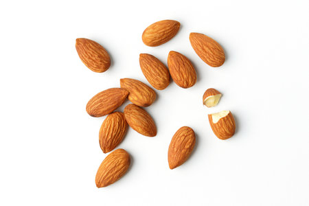 Almond lays the top corner shooting pile on the white background with clipping path suitable for productの写真素材