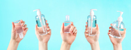 bottle alcohol clean with hand sanitiser liquid bottle . concenpt protection sanitiser tool protect corona virus on  turqouise isolated background bannerの写真素材