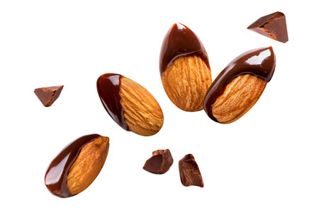 almond chocolate blast fly chocolate nuts isolated on white isolatedの写真素材