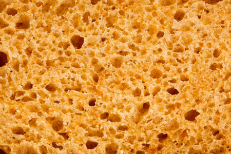 a piece of bread texture backgroundの写真素材