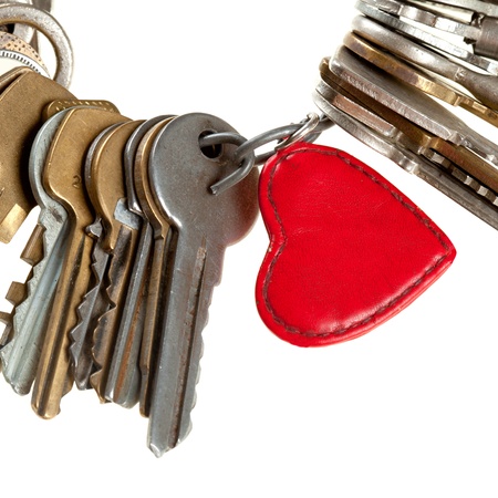 key to heart - bunch of keys with heart, image isolated on white backgroundの写真素材
