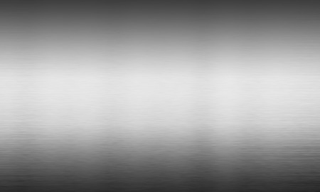 Metal texture background, brushed neutral surface, gray plateの写真素材