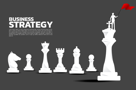 Silhouette of businessman with red flag on chess piece king. Business Concept of strategy planning and successのイラスト素材